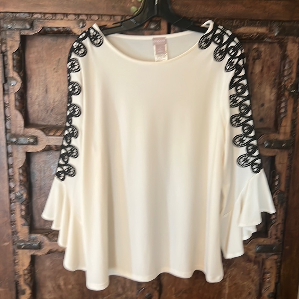 NWOT Chico’s off white top with black crochet appliqué  sleeve